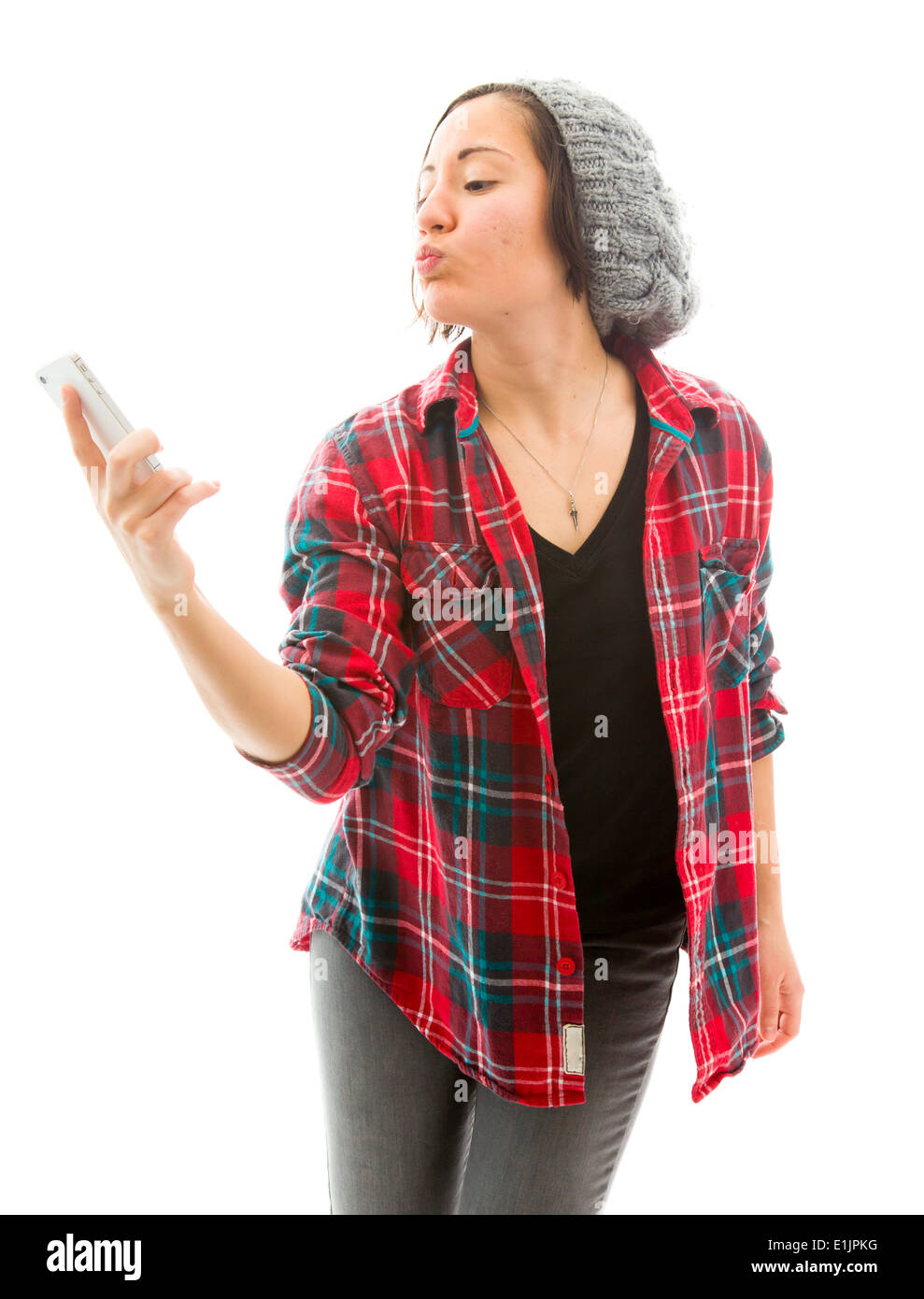 Young woman taking photo d'elle-même avec un téléphone mobile Banque D'Images