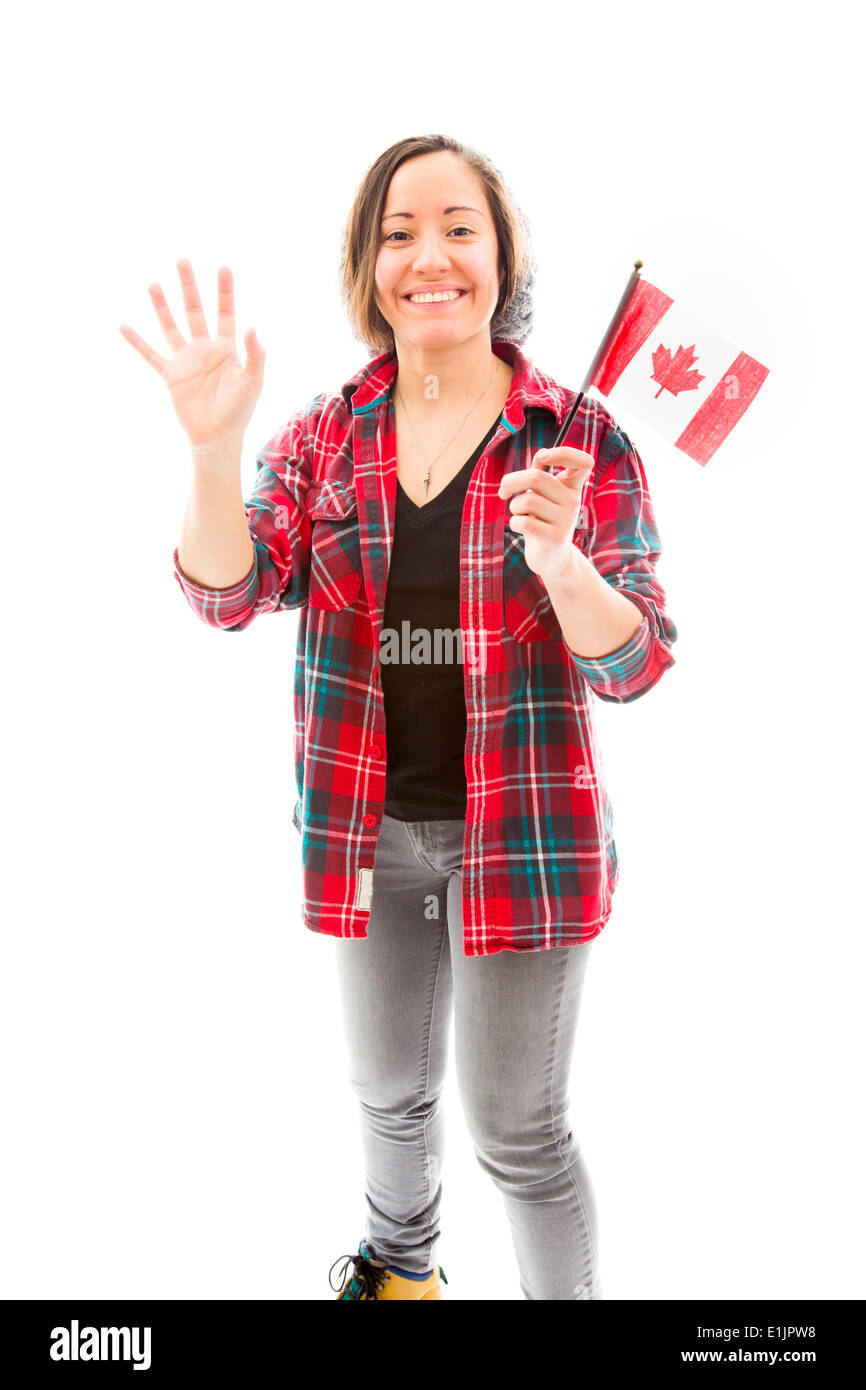 Jeune femme en agitant la main avec drapeau Canada holding and smiling Banque D'Images