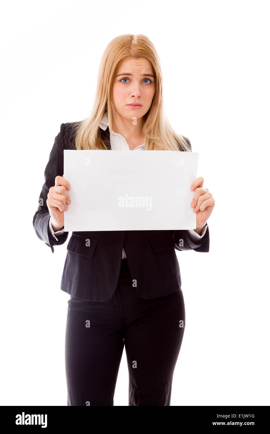 Contrarié businesswoman holding a blank placard isolé sur fond blanc Banque D'Images