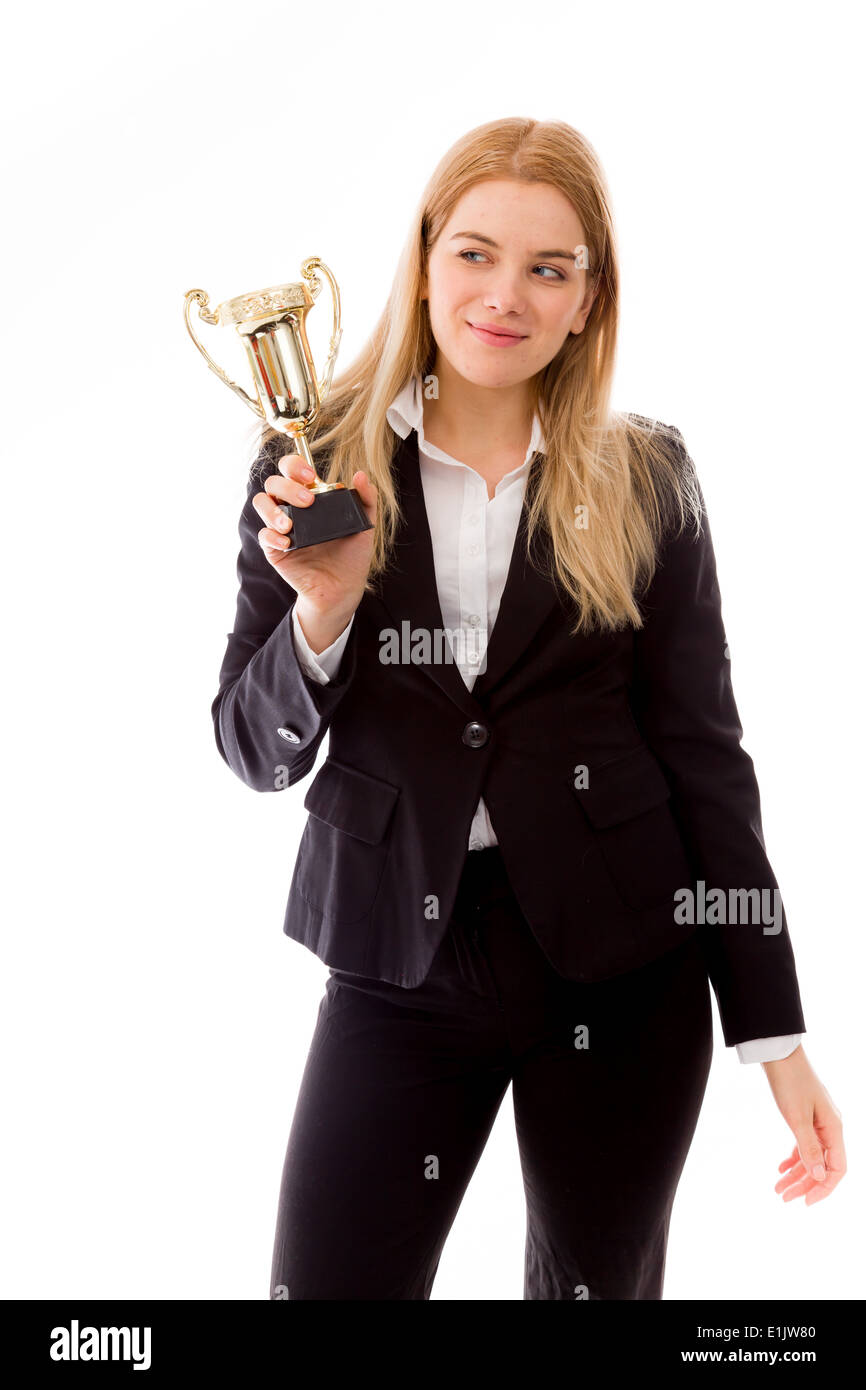 Businesswoman holding a golden trophy Banque D'Images