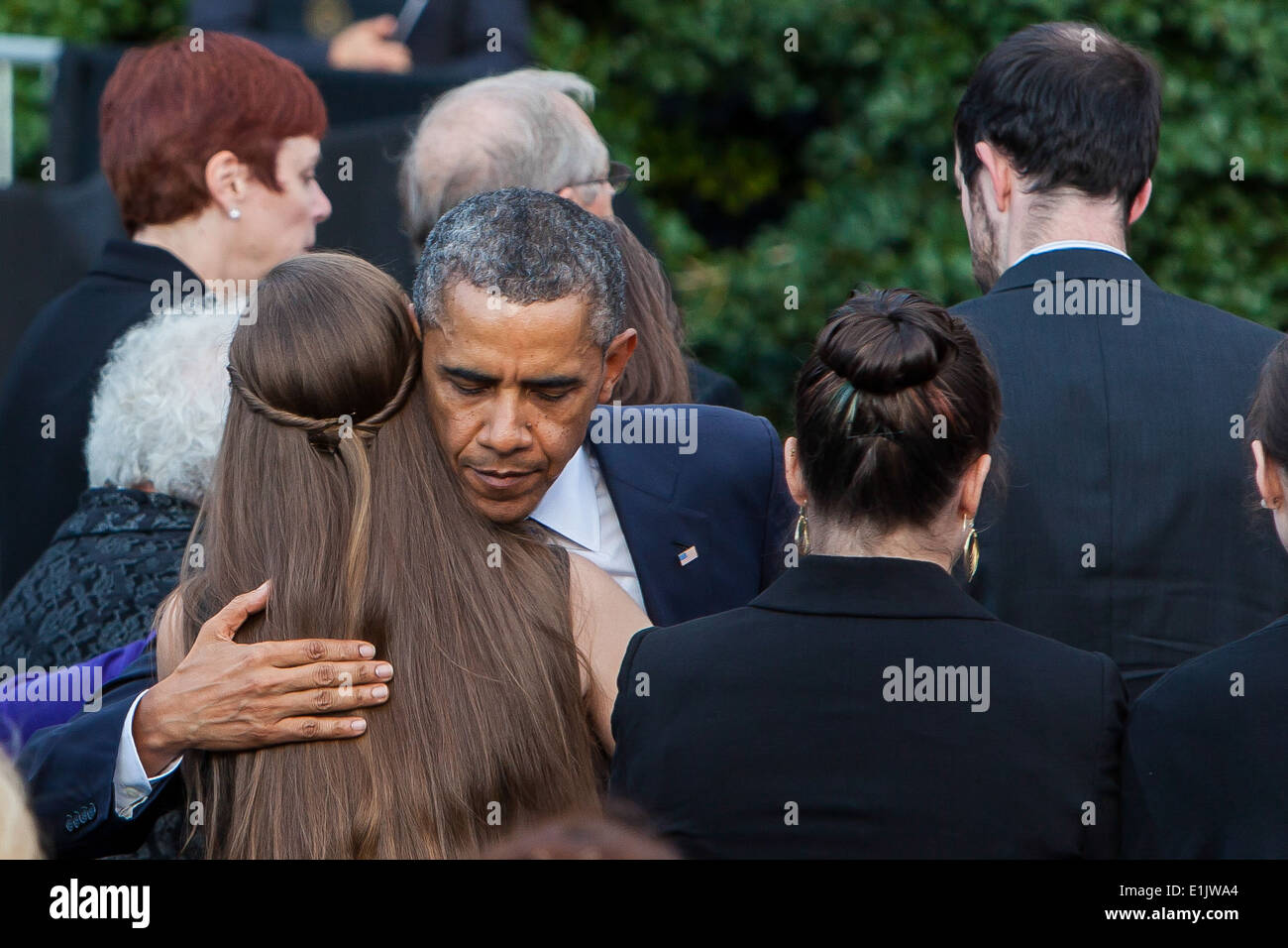 Le président Barack Obama vidéo des membres des familles des victimes de la fusillade au cours de l'arsenal d'un service commémoratif du 22 septembre 2013, Banque D'Images