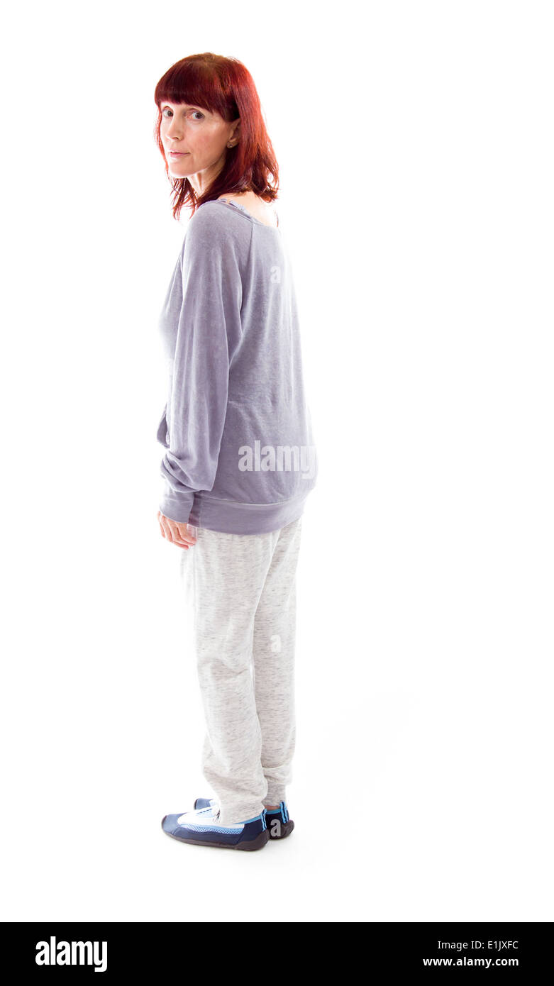 Young woman looking over shoulder Banque D'Images