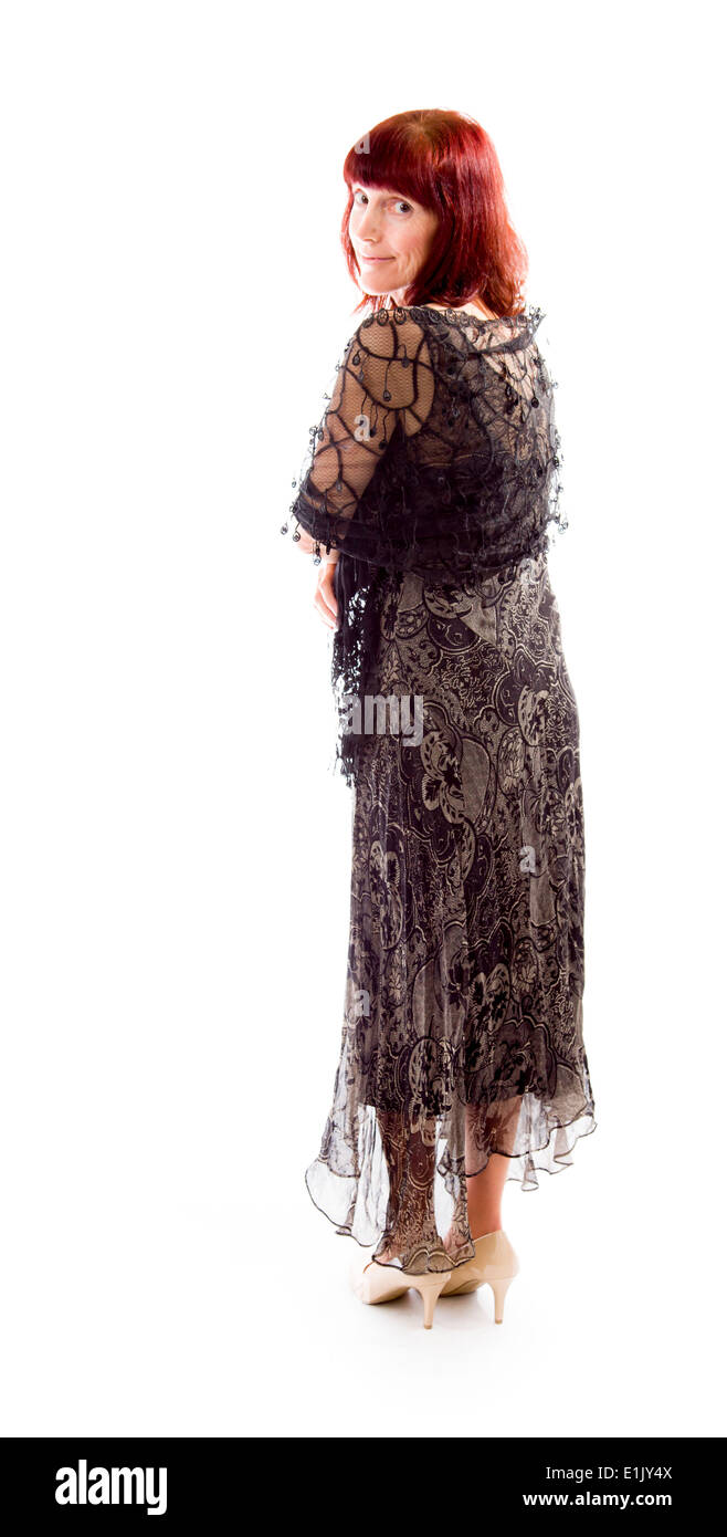 Young woman looking over shoulder Banque D'Images