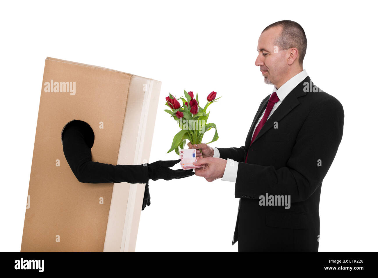 Concept : un homme d'affaires a commandé un livreur de fleurs Banque D'Images