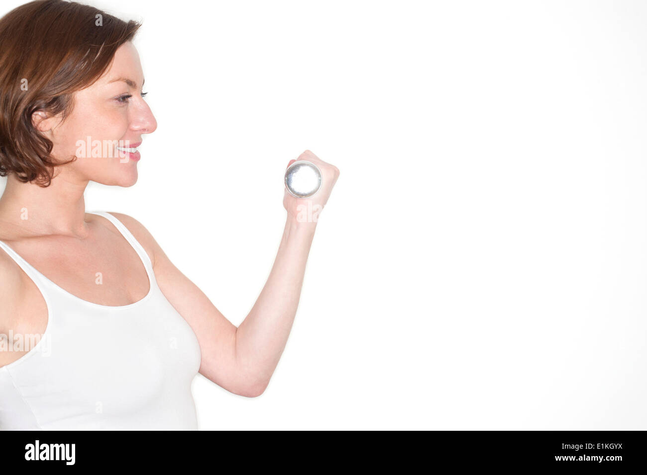 Parution à l'aide de la femme modèle poids studio shot. Banque D'Images