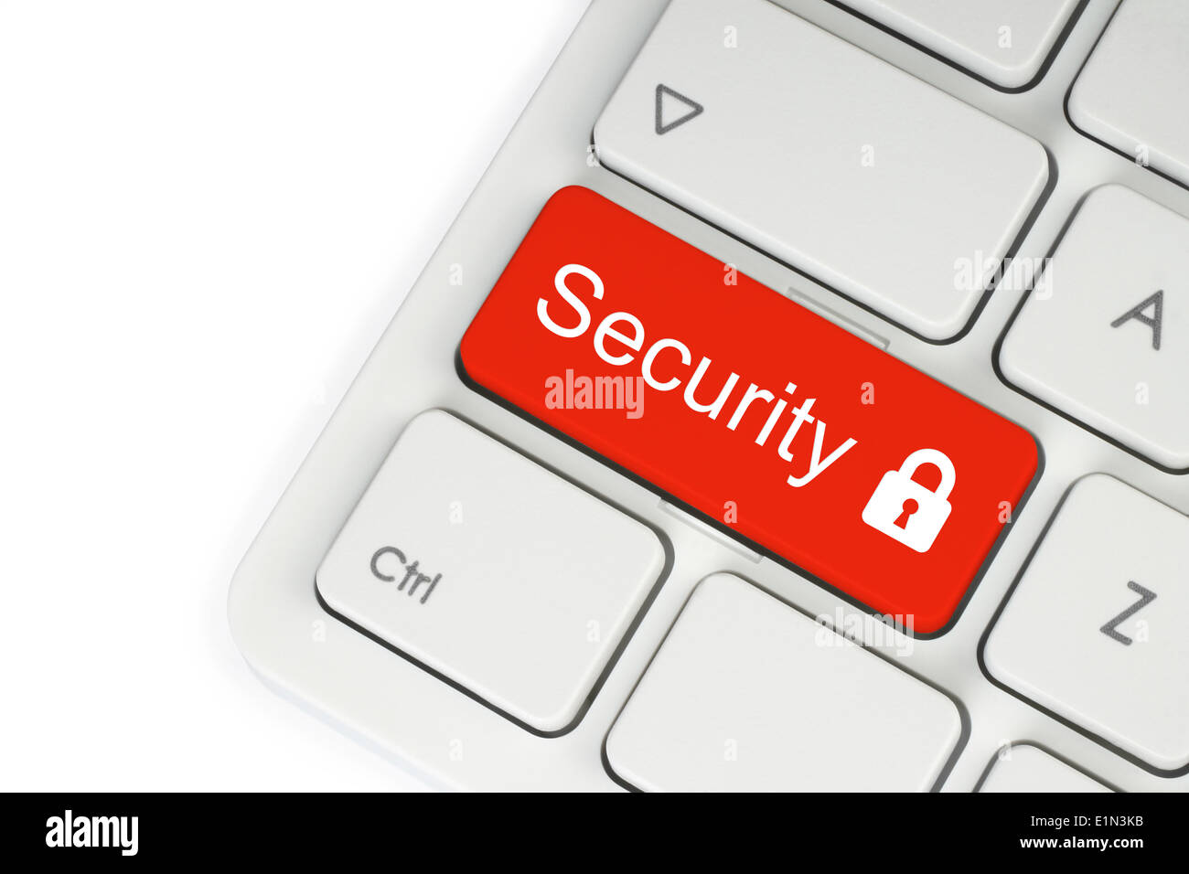 Bouton de sécurité rouge sur le clavier sur fond blanc Banque D'Images