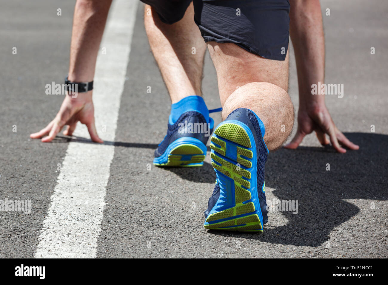 Coureur en position de départ. Banque D'Images