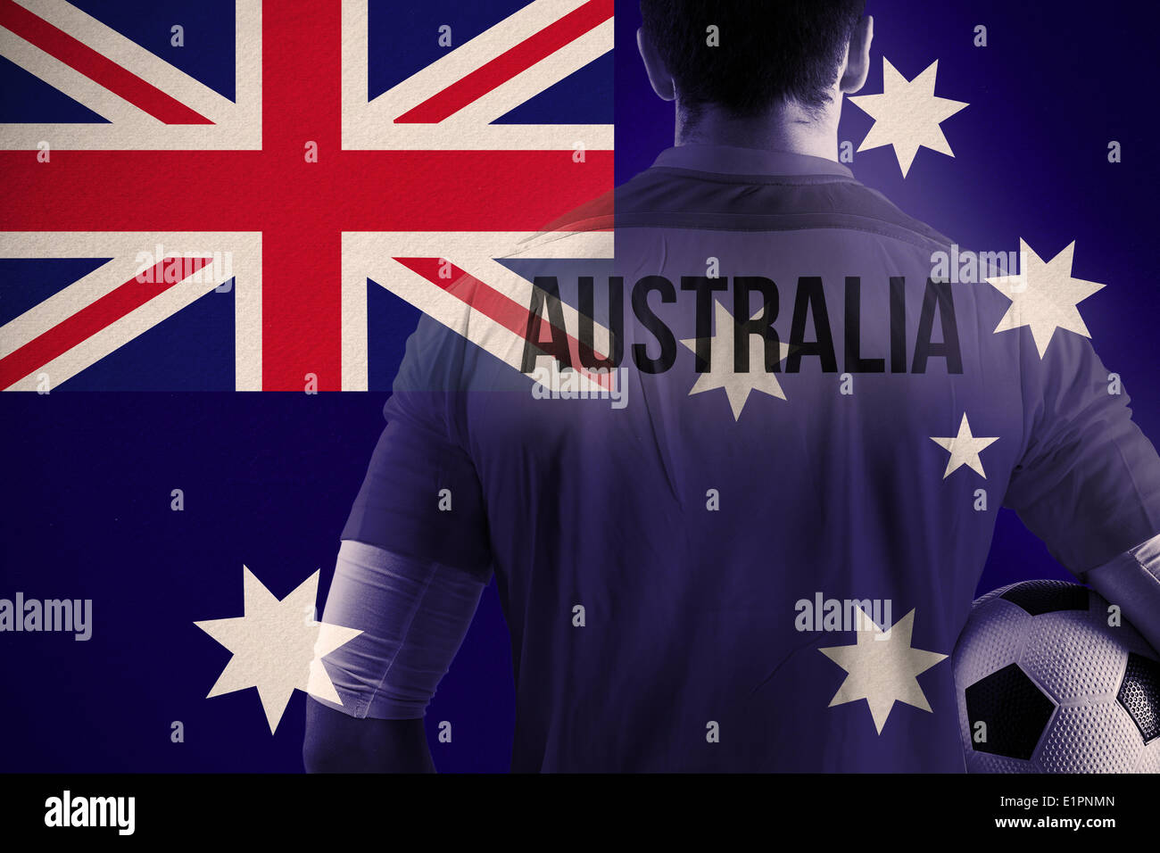 Image composite de l'Australie football player holding ball Banque D'Images