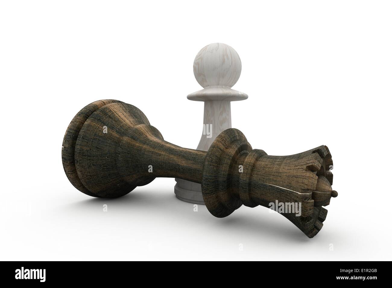 Le pion blanc debout sur tombé roi noir Banque D'Images