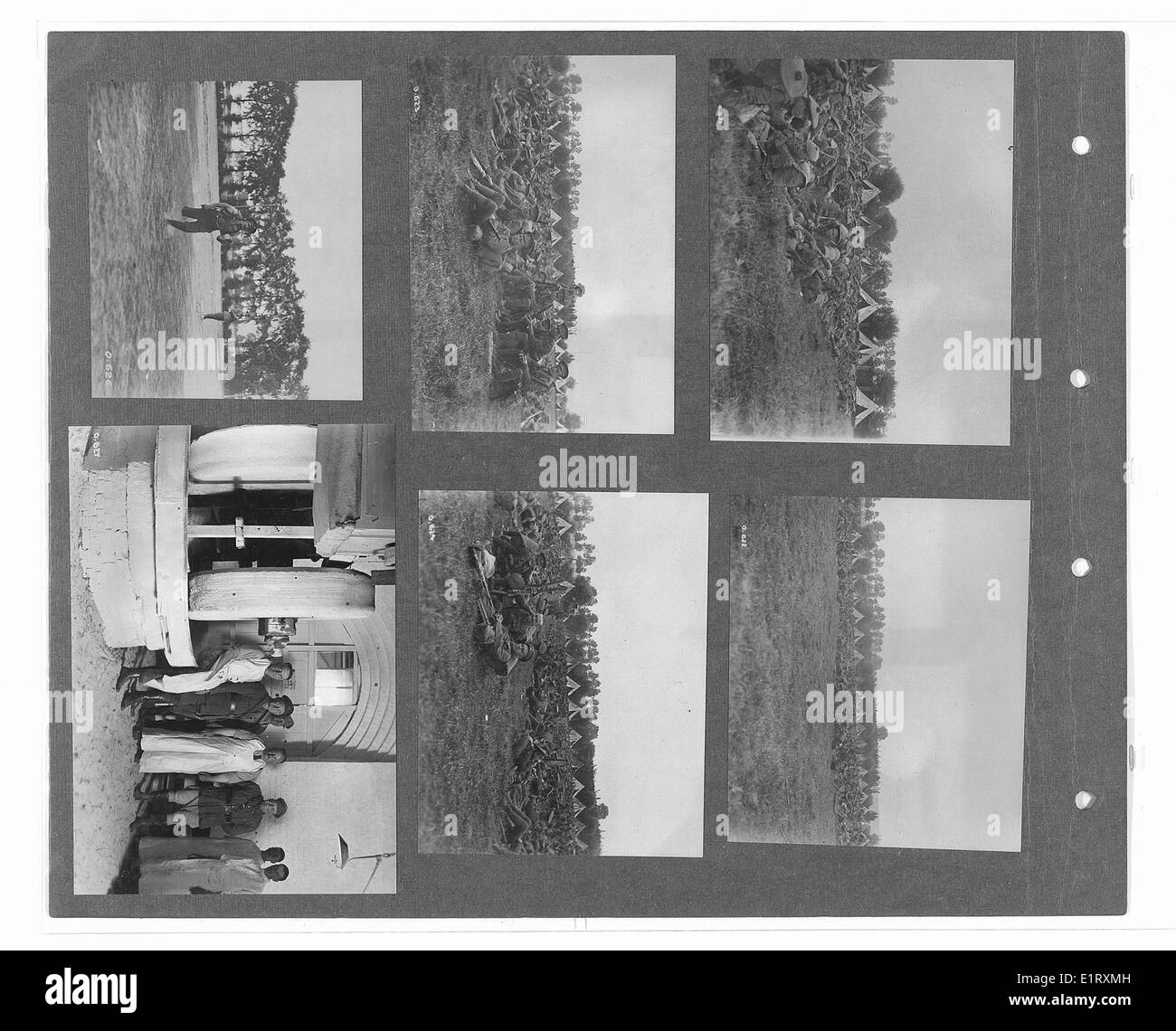 Cette photo du Fonds des monuments commémoratifs de guerre canadiens met en évidence les troupes du corps indien, y compris les 15e sikhs, 18e lanciers et 39e Garhwalis, pendant leur service pendant la première Guerre mondiale. L'image les montre engagés dans un moment de repos près de Merville, en France, avec des personnages notables tels que le major Watt et Sir Partab Singh en toile de fond. Banque D'Images