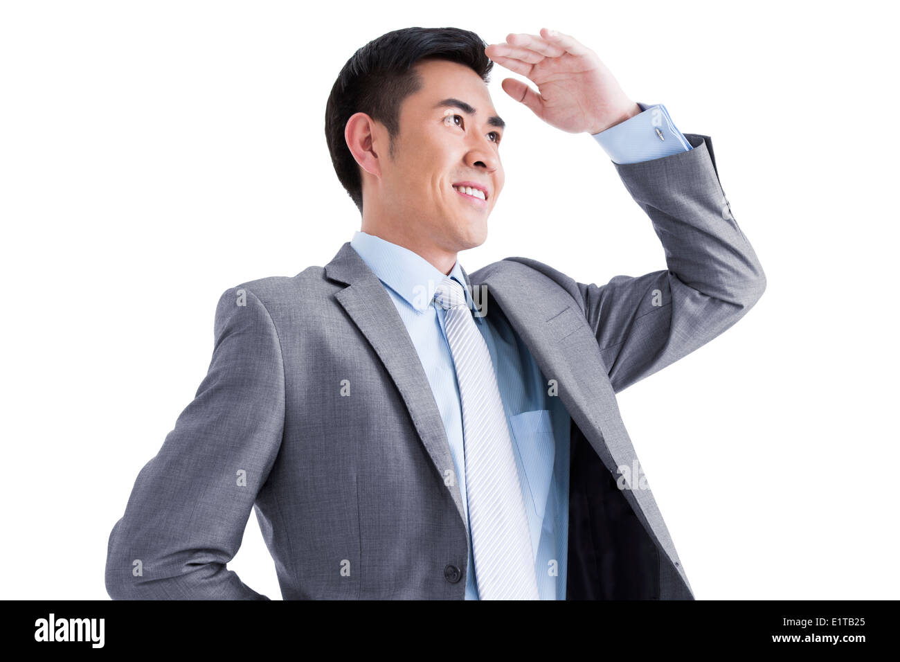 Happy businessman looking dans la distance Banque D'Images