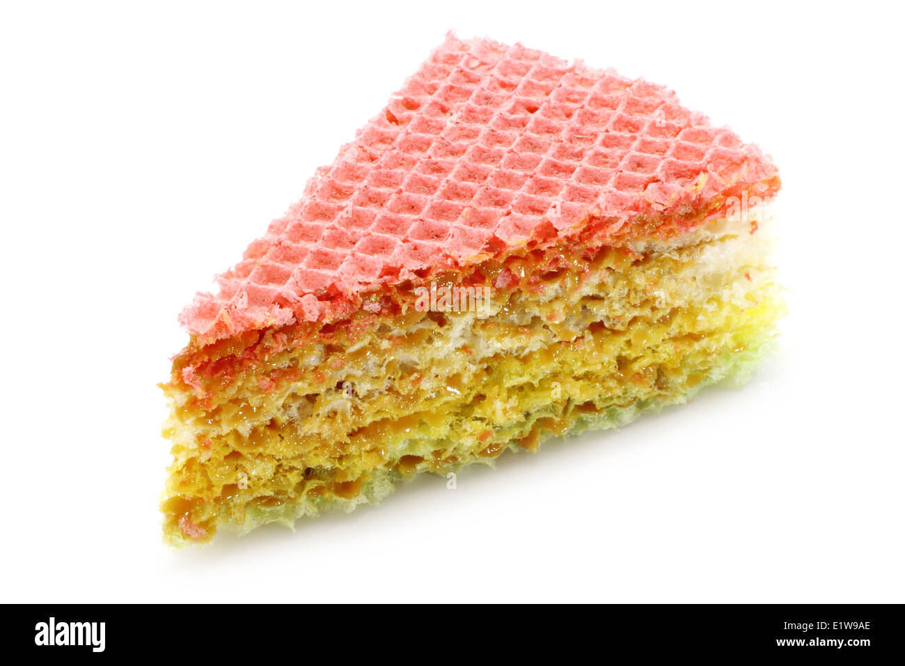 Un morceau de gâteau une gaufre avec du lait condensé sur un fond blanc  Photo Stock - Alamy