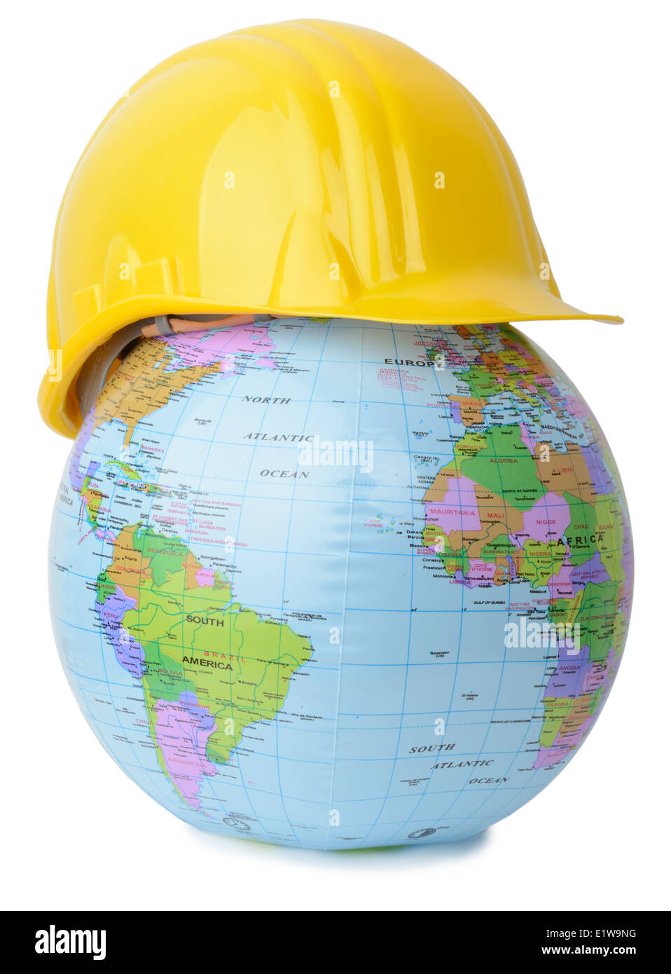 Notion de marché de la construction du monde, casque sur le monde Banque D'Images