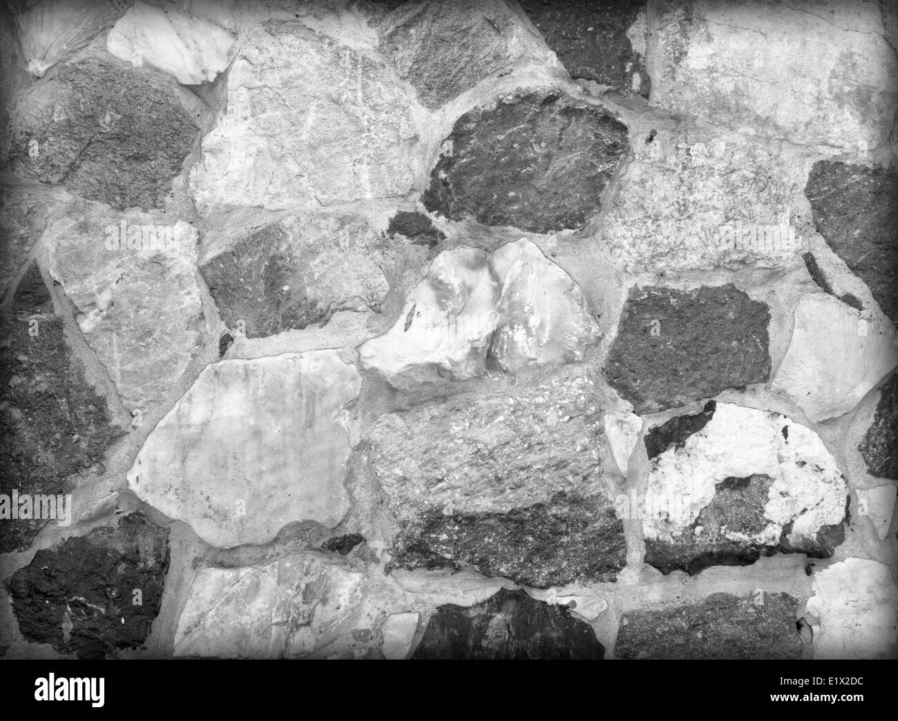 L'arrière-plan de la texture du mur de pierre ancienne. Banque D'Images L'arrière-plan de la texture du mur de pierre ancienne. Banque D'Images