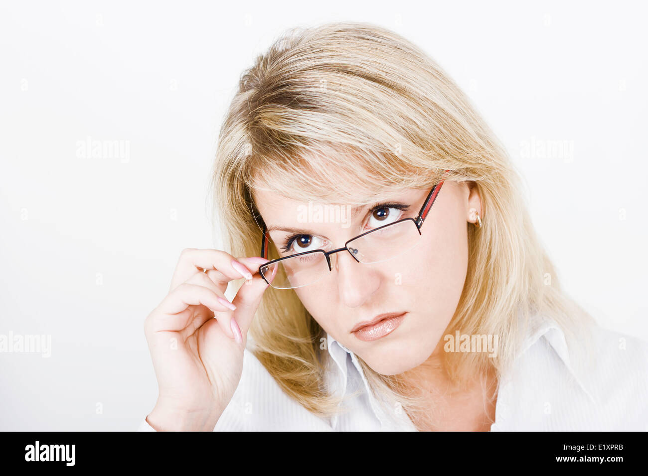 Strong girl avec des lunettes Banque D'Images