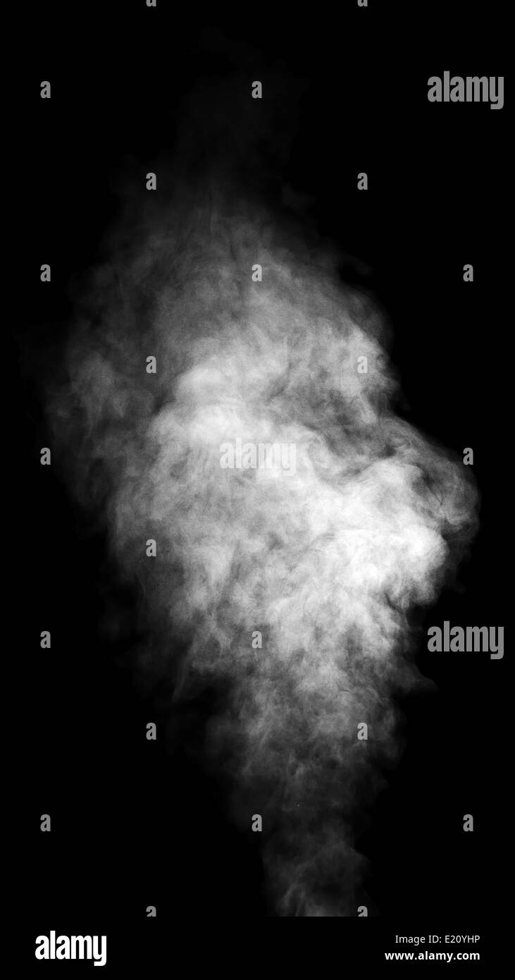 Véritable machine à vapeur blanc isolé sur fond noir avec des gouttelettes visibles. Banque D'Images