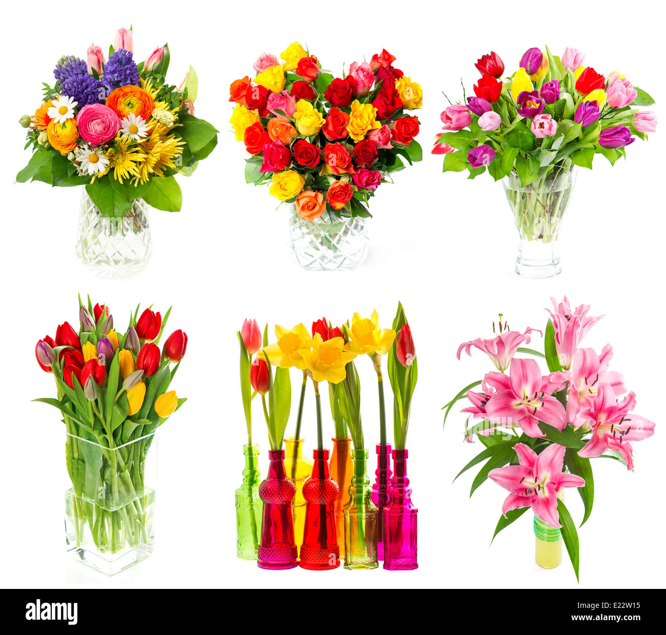 Beau bouquet de fleurs dans un vase. tulipes, roses, narcisses, fleurs de lys sur fond blanc. Banque D'Images