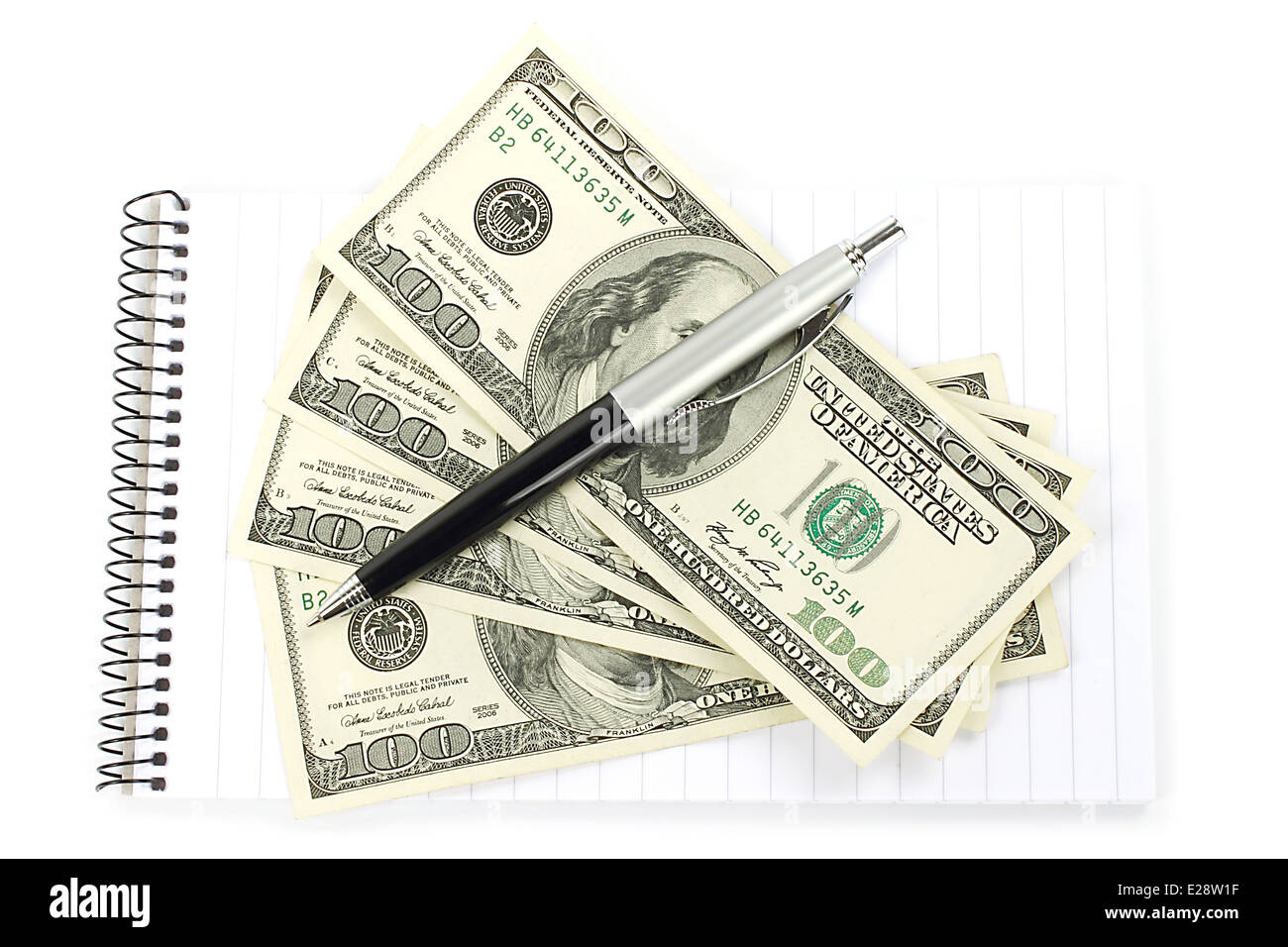 L'argent et le bloc-notes avec stylo sur fond blanc Banque D'Images L'argent et le bloc-notes avec stylo sur fond blanc Banque D'Images