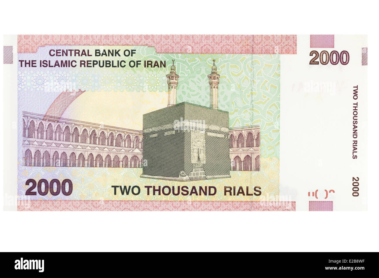 Deux mille billets rial iranien sur fond blanc Banque D'Images