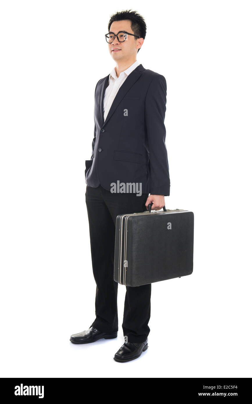 Asian businessman with a suitcase isolated on white Banque D'Images