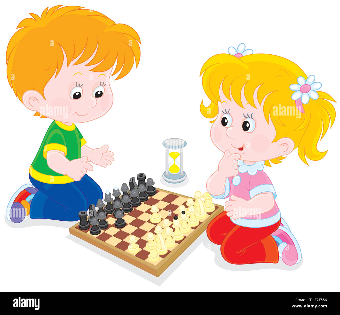 Little Boy and girl playing chess Banque D'Images