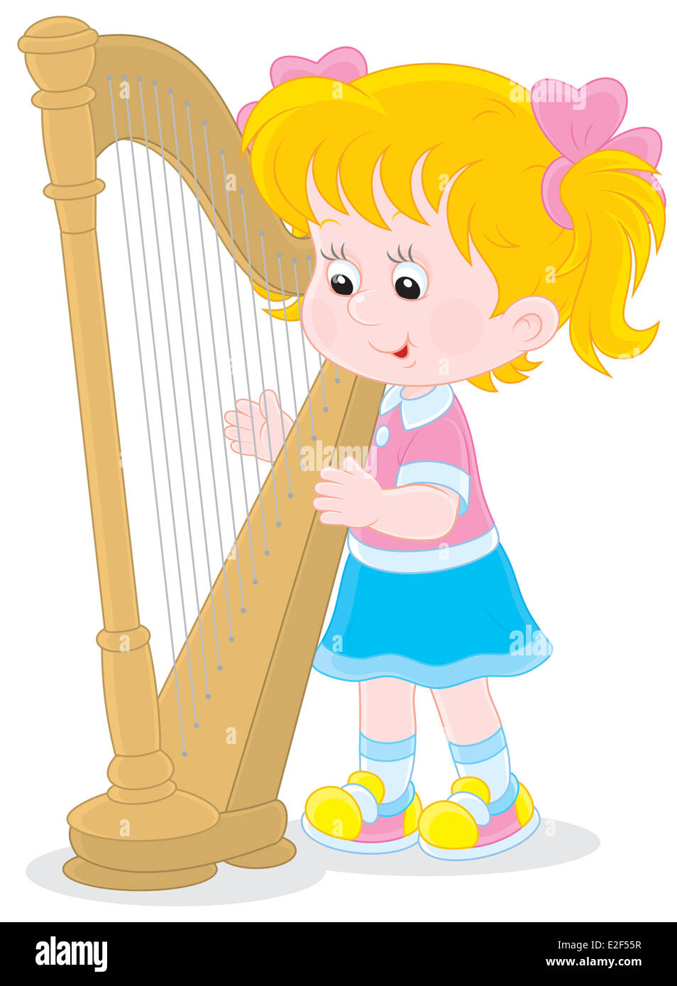 Petite fille jouer a big harp Banque D'Images
