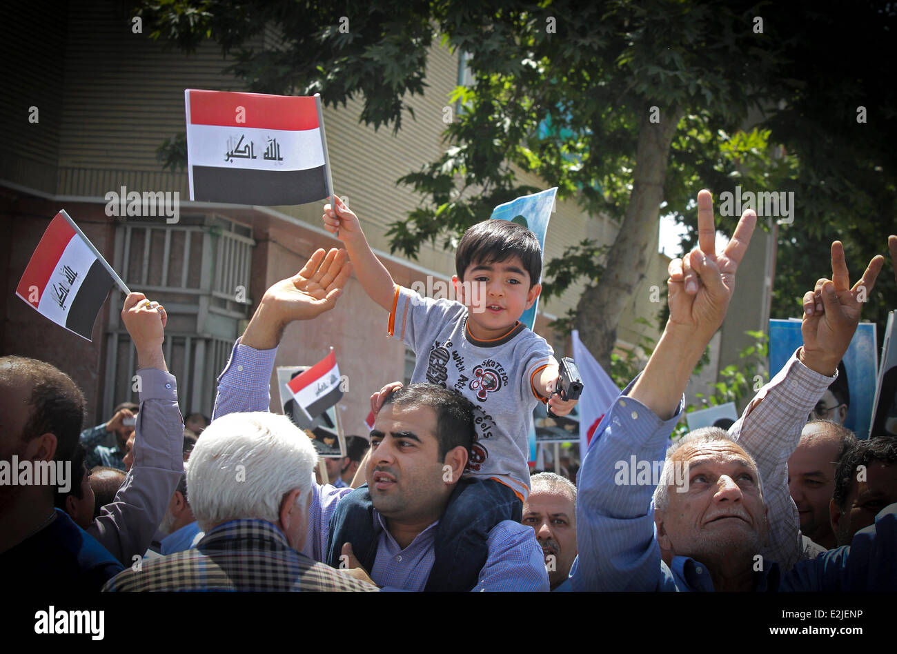 Téhéran, Iran. 20 Juin, 2014. Irakiens vivant à prendre part à une manifestation contre les attaques menées par l'État islamique d'Irak et du Levant (EIIL), dans le sud de Téhéran, Iran, le 20 juin 2014. Credit : Ahmad Halabisaz/Xinhua/Alamy Live News Banque D'Images
