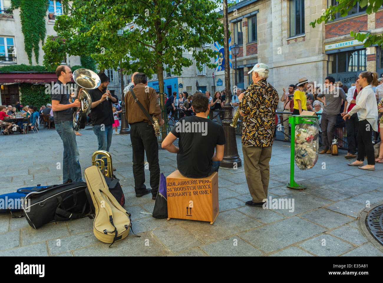 Crowd listening to musicians in Paris