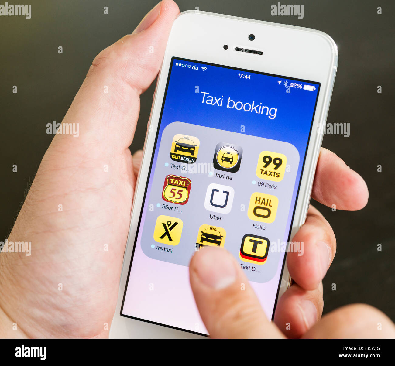 Détail des applications mobiles pour la réservation de taxis sur iPhone smart phone Banque D'Images