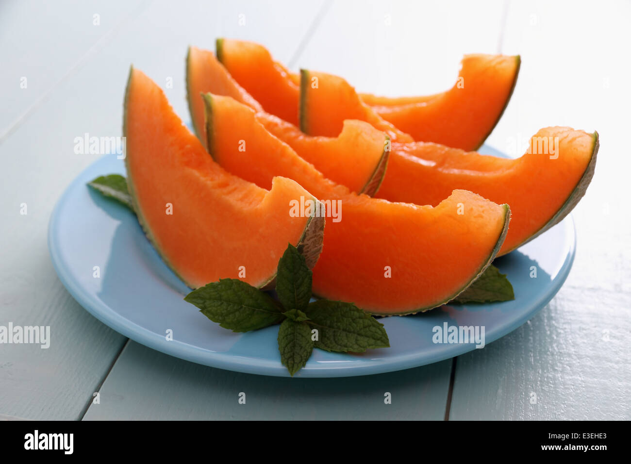 Melon cantaloup à la menthe comme rafraîchissement sain, Close up Banque D'Images