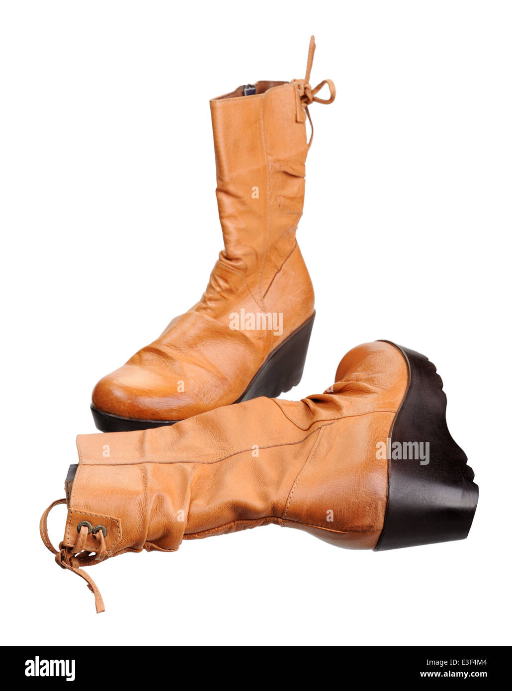 Une paire de bottes femmes, isolé sur fond blanc Banque D'Images