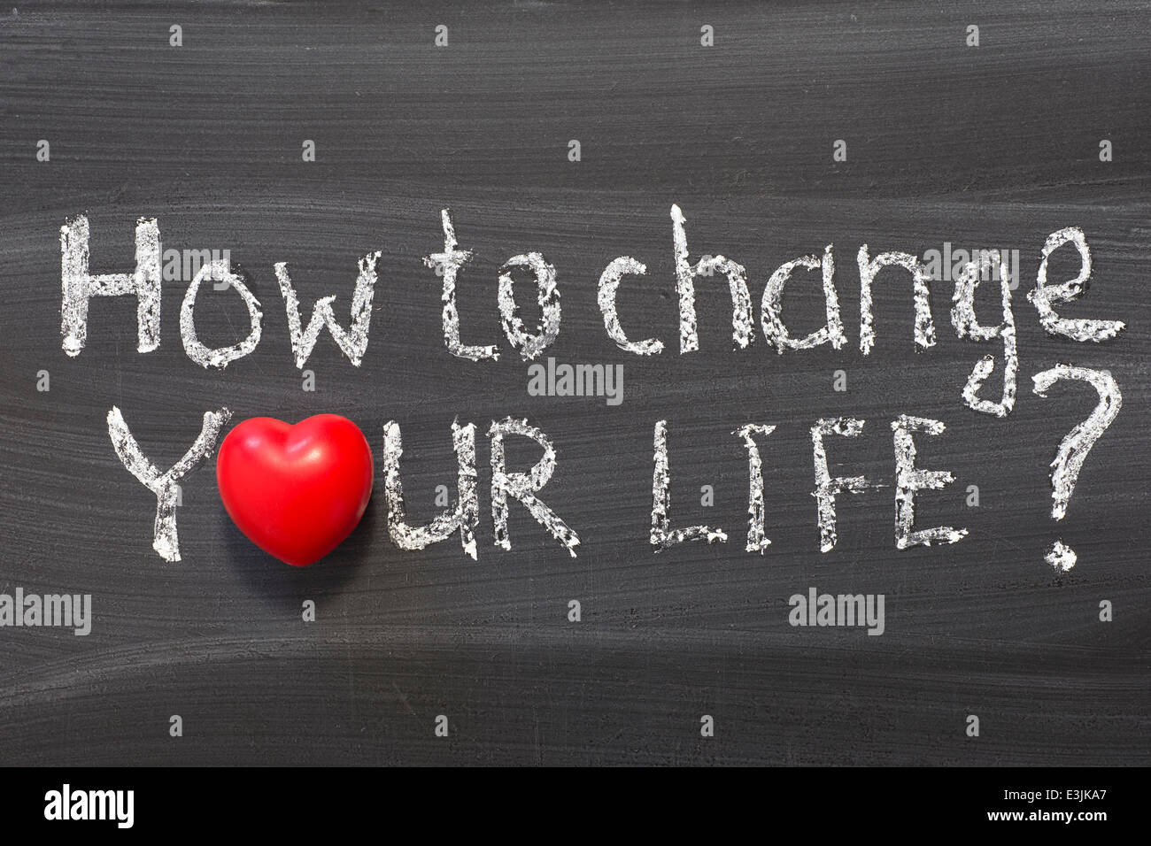 Comment changer votre vie question à la main sur tableau noir de l'école Banque D'Images