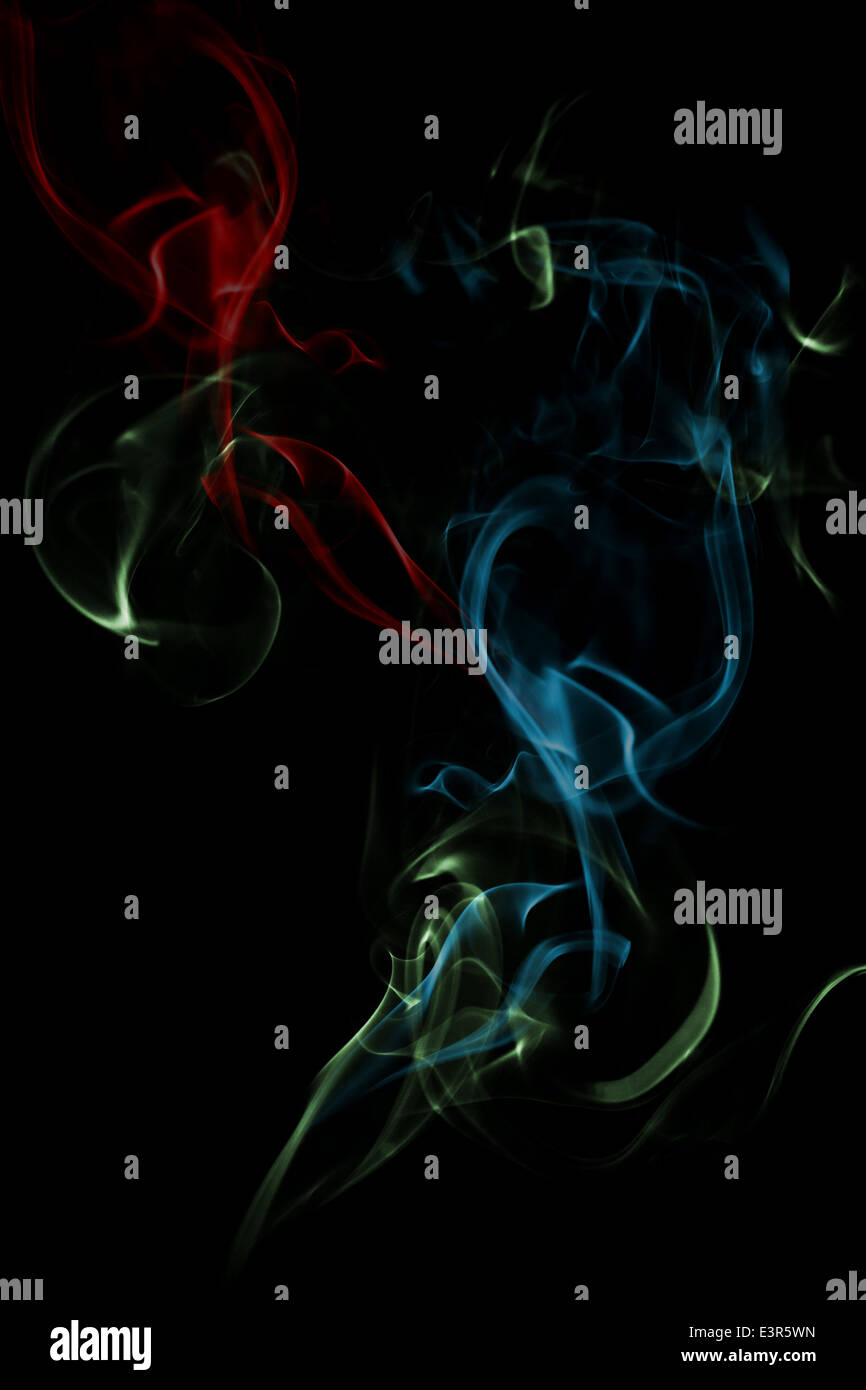 Abstract colorful background fumée ondulant sur noir Banque D'Images