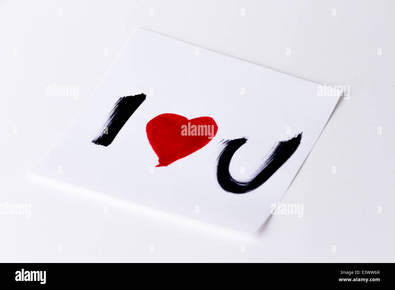 I love u / i heart u carte sur un fond blanc, isolé studio Banque D'Images