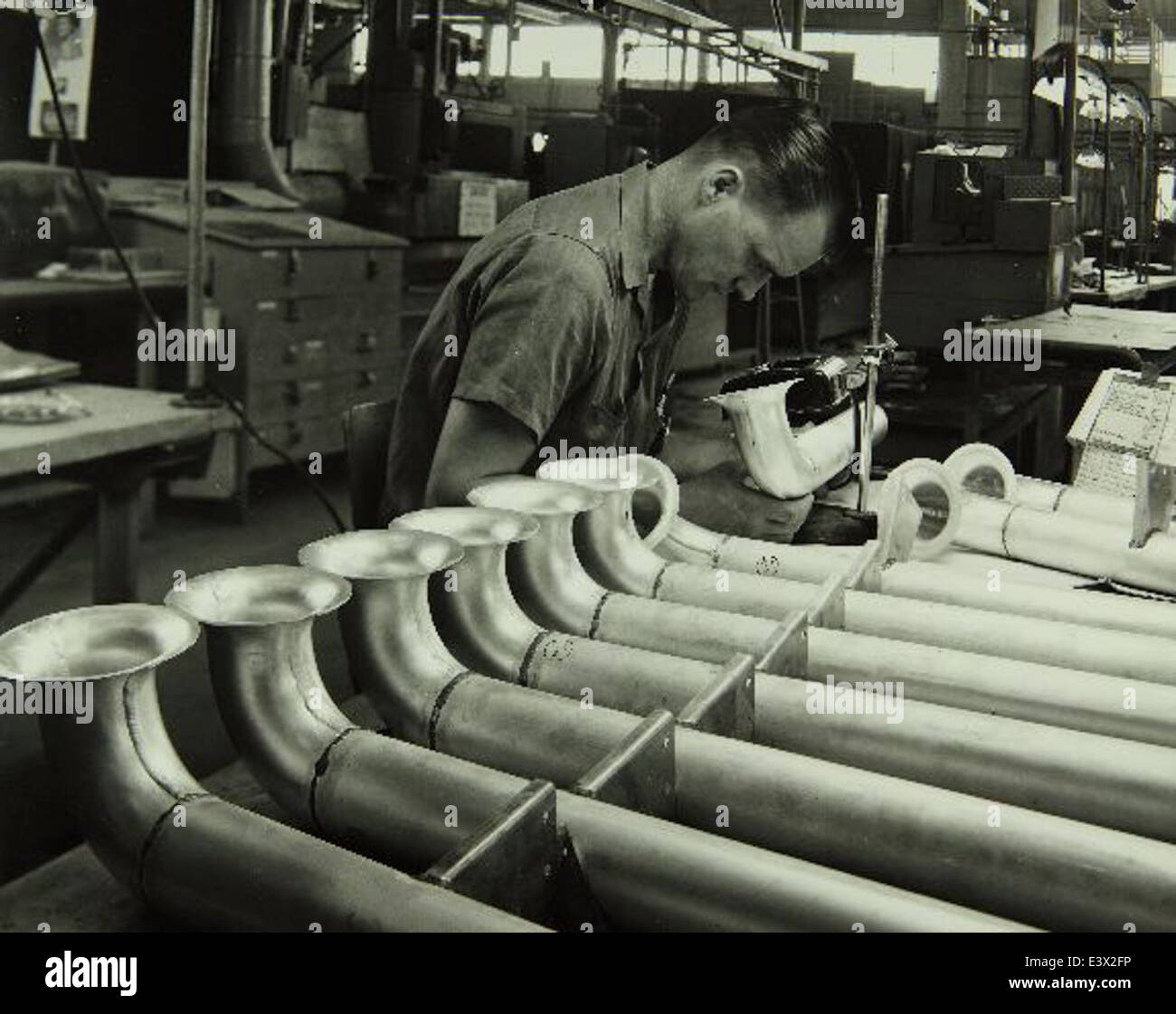 Cette image représente l'usine Consolidated/Convair Aircraft Co., située à San Diego, en Californie. La société a joué un rôle déterminant dans le développement de plusieurs avions militaires et civils clés au cours du XXe siècle, contribuant de manière significative à l'industrie aérospatiale américaine. Banque D'Images