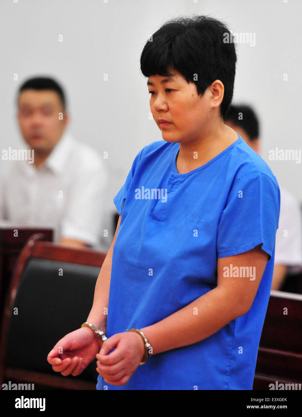 Wuhan, Wuhan City. 1er juillet 2014. Cao Yinhua, 48, un leader régional du culte illégal (Quannengshen dieu tout-puissant), est jugé par le tribunal populaire du district de Wuchang, Wuhan City, le 1er juillet 2014. Le CAO a été condamné à quatre ans de prison, conformément à l'arrêt de la cour. © Xiao Yijiu/Xinhua/Alamy Live News Banque D'Images