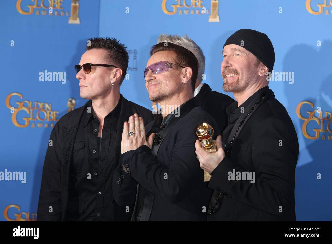 71e Golden Globes Annuel - Salle de presse : Larry Mullen Jr. (l-r), Bono et The Edge de U2 où : Los Angeles, United Kingdom Quand : 12 Jan 2014 Banque D'Images