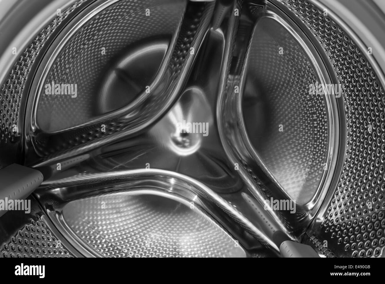 Lave-linge à tambour de prise de vue macro Banque D'Images