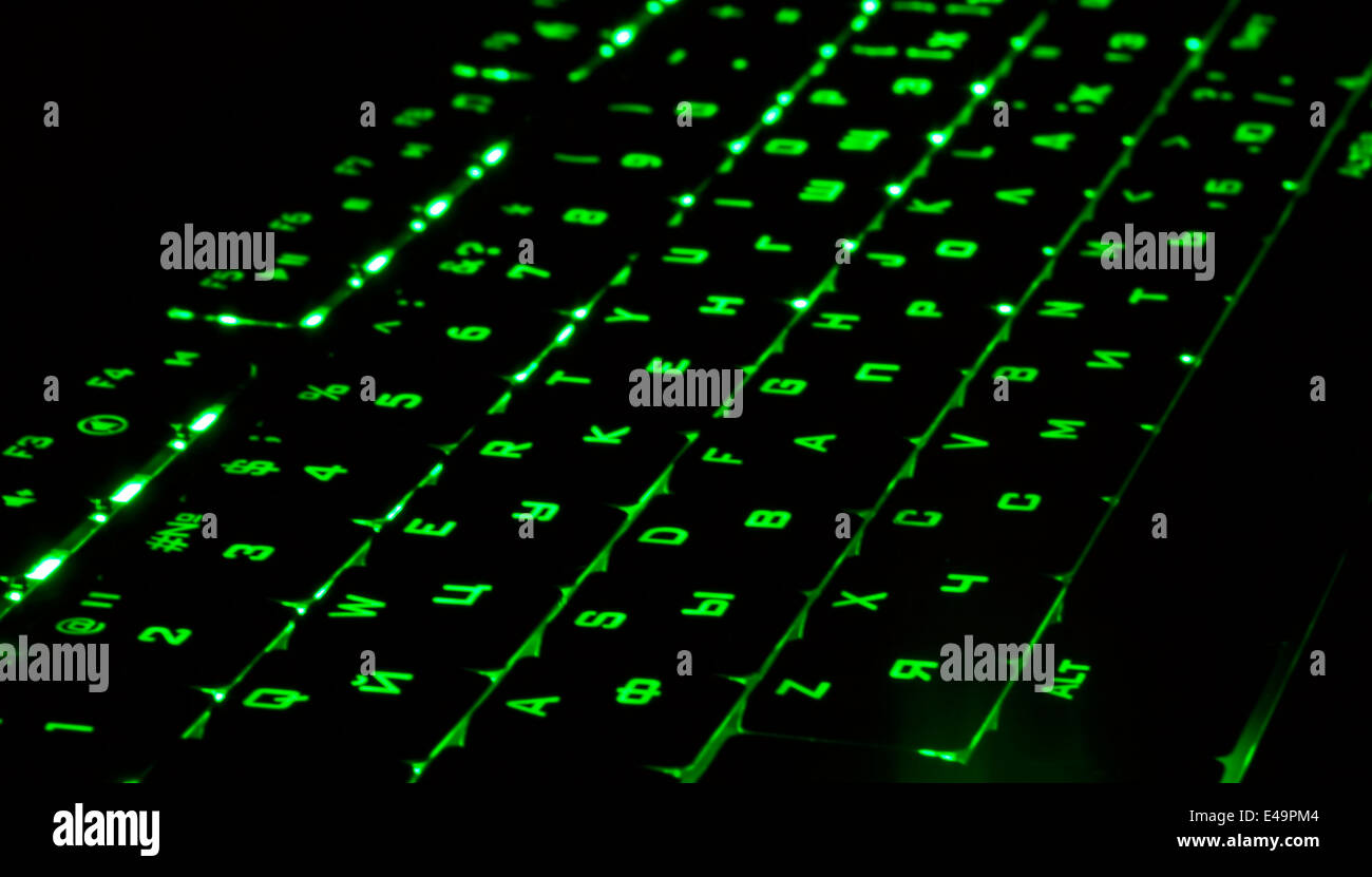 Clavier d'éclairage vert dans le noir Banque D'Images