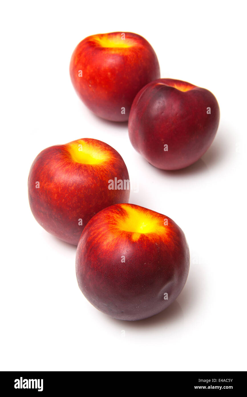 Nectarines isolated on a white background studio. Banque D'Images