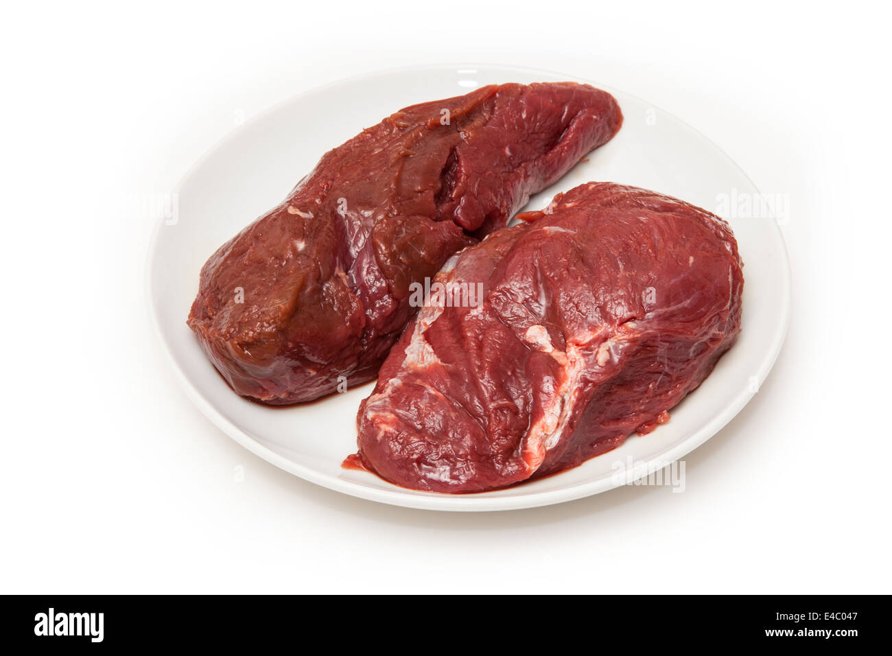 Steaks de viande de kangourou crus isolated on a white background studio. Banque D'Images