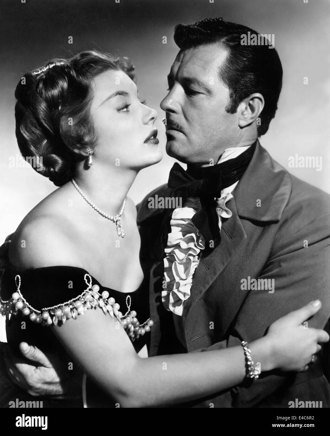 Barbara Peyton, James Craig, sur-ensemble du film, 'Drhums dans le Grand Sud', 1951 Banque D'Images