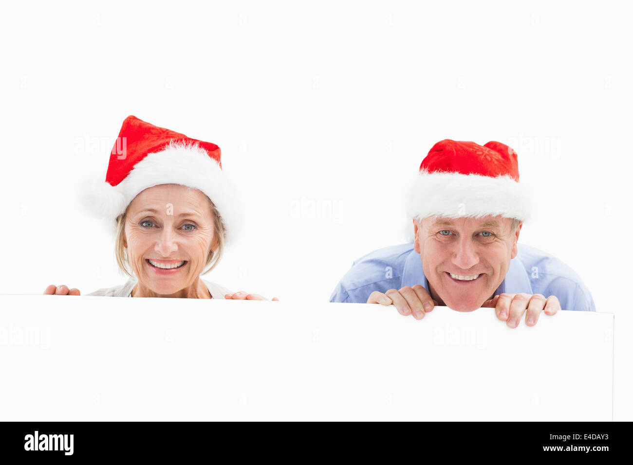 Ambiance festive mature couple smiling at camera Banque D'Images