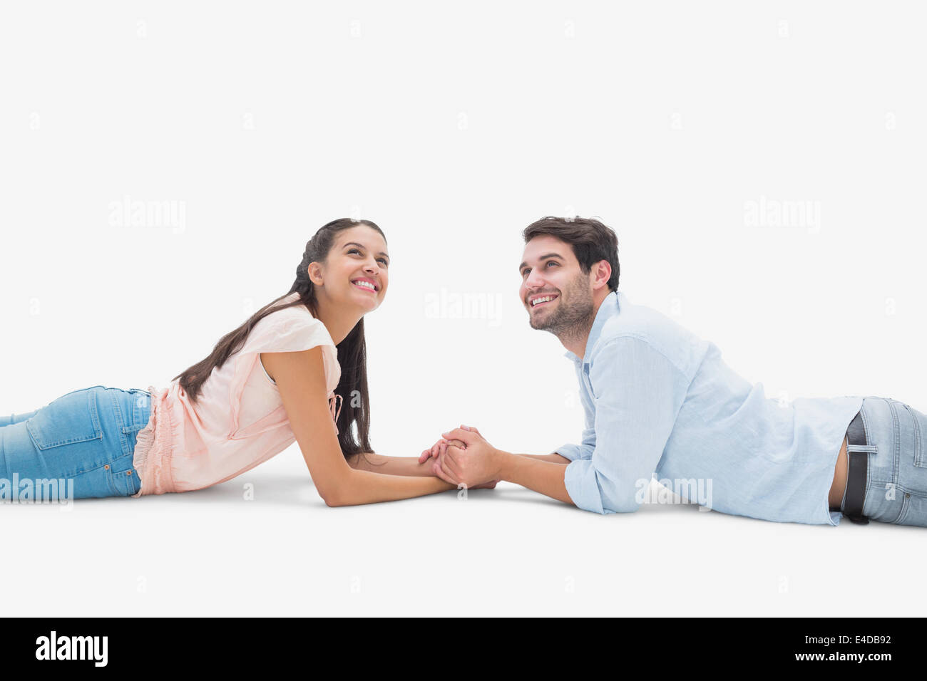Attractive young couple looking up Banque D'Images