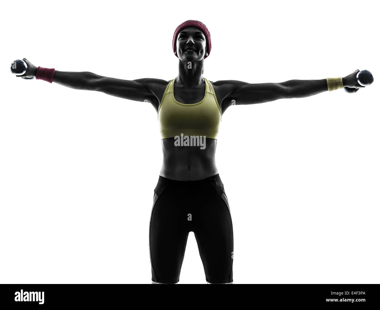 Une femme l'exercice de formation de poids d'entraînement de forme physique en silhouette sur fond blanc Banque D'Images