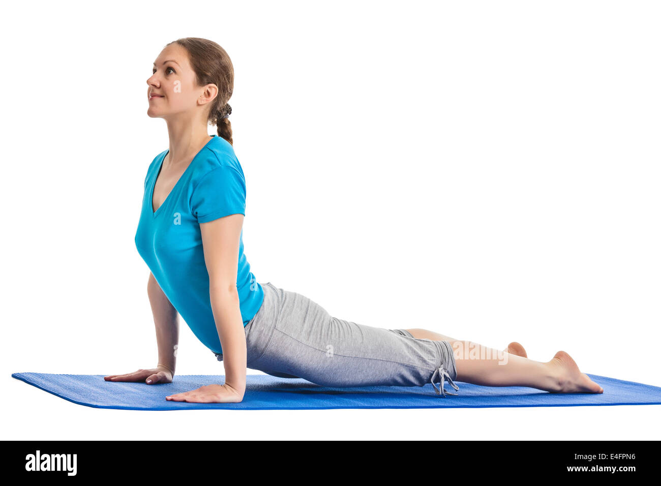 Yoga - jeune belle femme professeur de yoga faisant du Cobra posent (Back Bend) (Urdhva Mukha Svanasana) exercice d'asanas Banque D'Images
