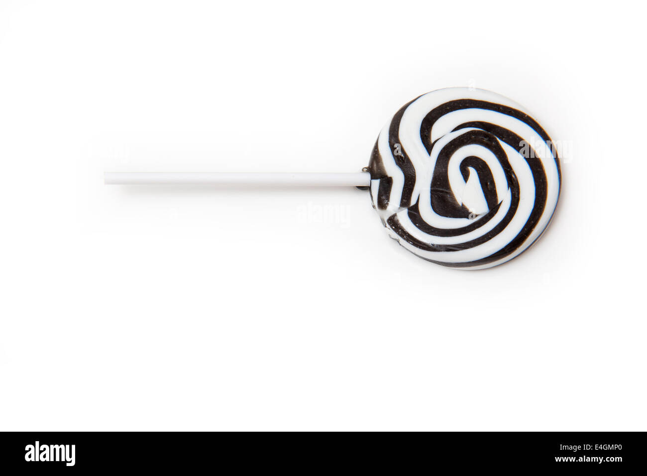 Zebra noir et blanc rayé lollipop isolated on a white background studio. Banque D'Images