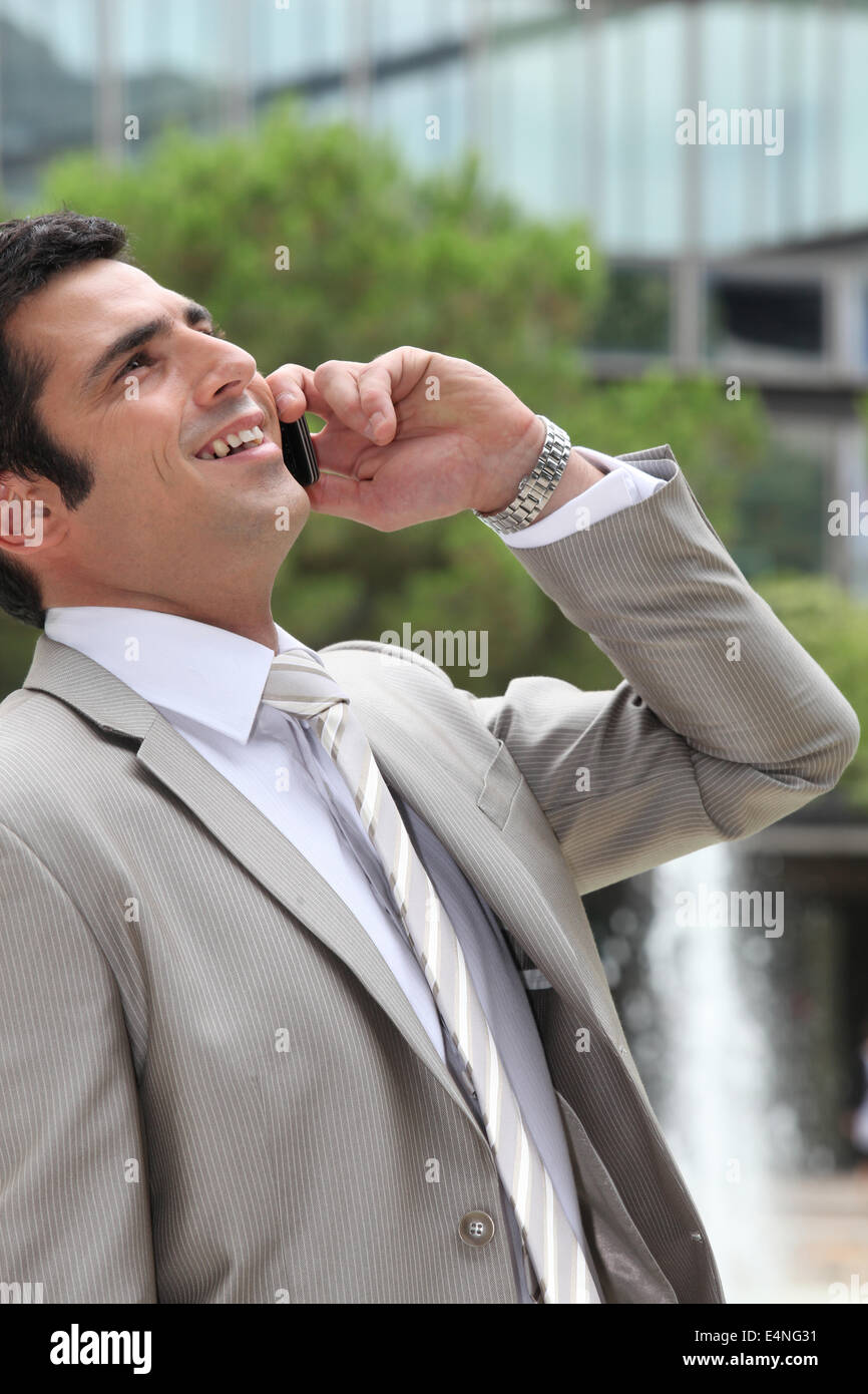 Travailleur sur le téléphone Banque D'Images