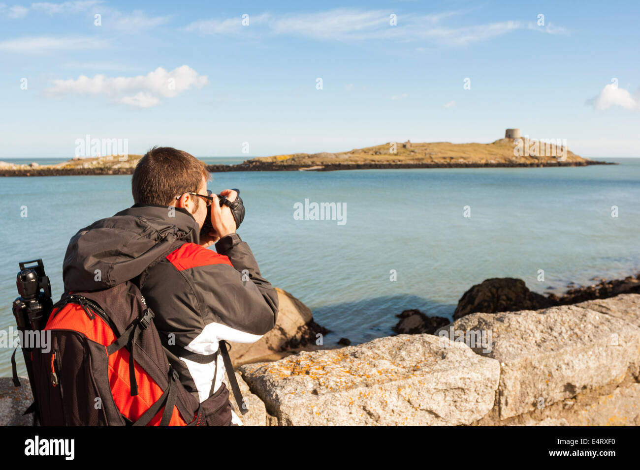 Le jeune photographe dans la côte Banque D'Images