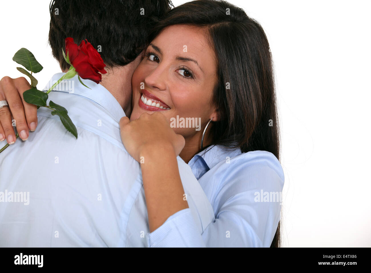 Couple avec rose dans la main Banque D'Images